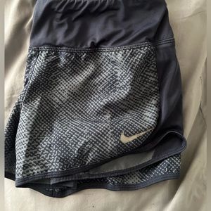 Grey Nike shorts.